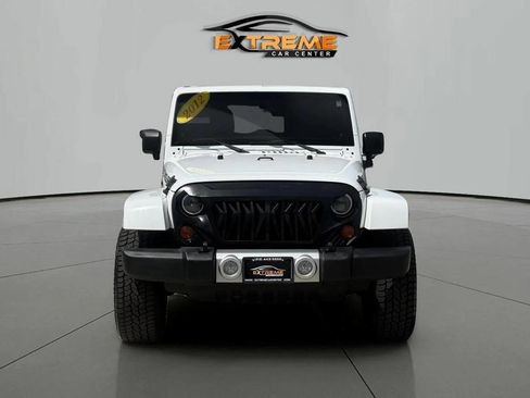 Used 2012 Jeep Wrangler Unlimited Sahara w/ Dual Top Group AWD/4WD image 9