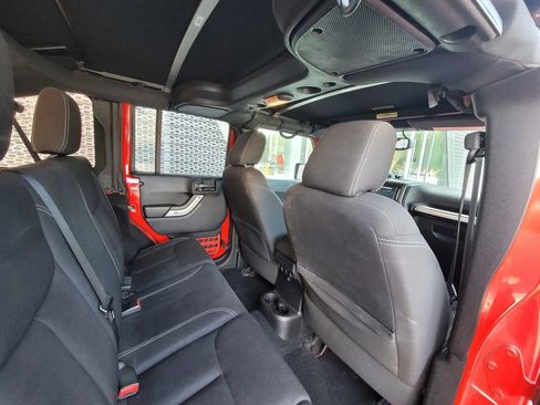 Used 2016 Jeep Wrangler Unlimited Sahara w/ Dual Top Group AWD/4WD image 21