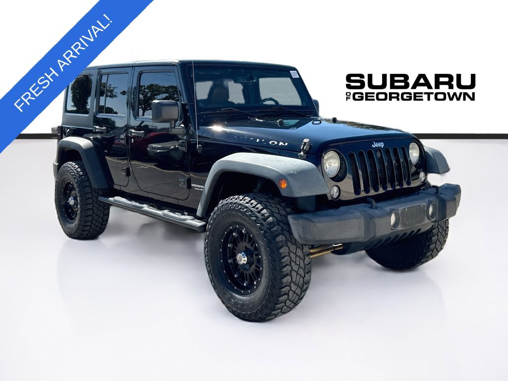 Used 2014 Jeep Wrangler Unlimited Rubicon w/ Connectivity Group AWD/4WD image 1