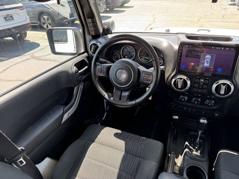 Used 2012 Jeep Wrangler Unlimited Sahara w/ Dual Top Group AWD/4WD image 24