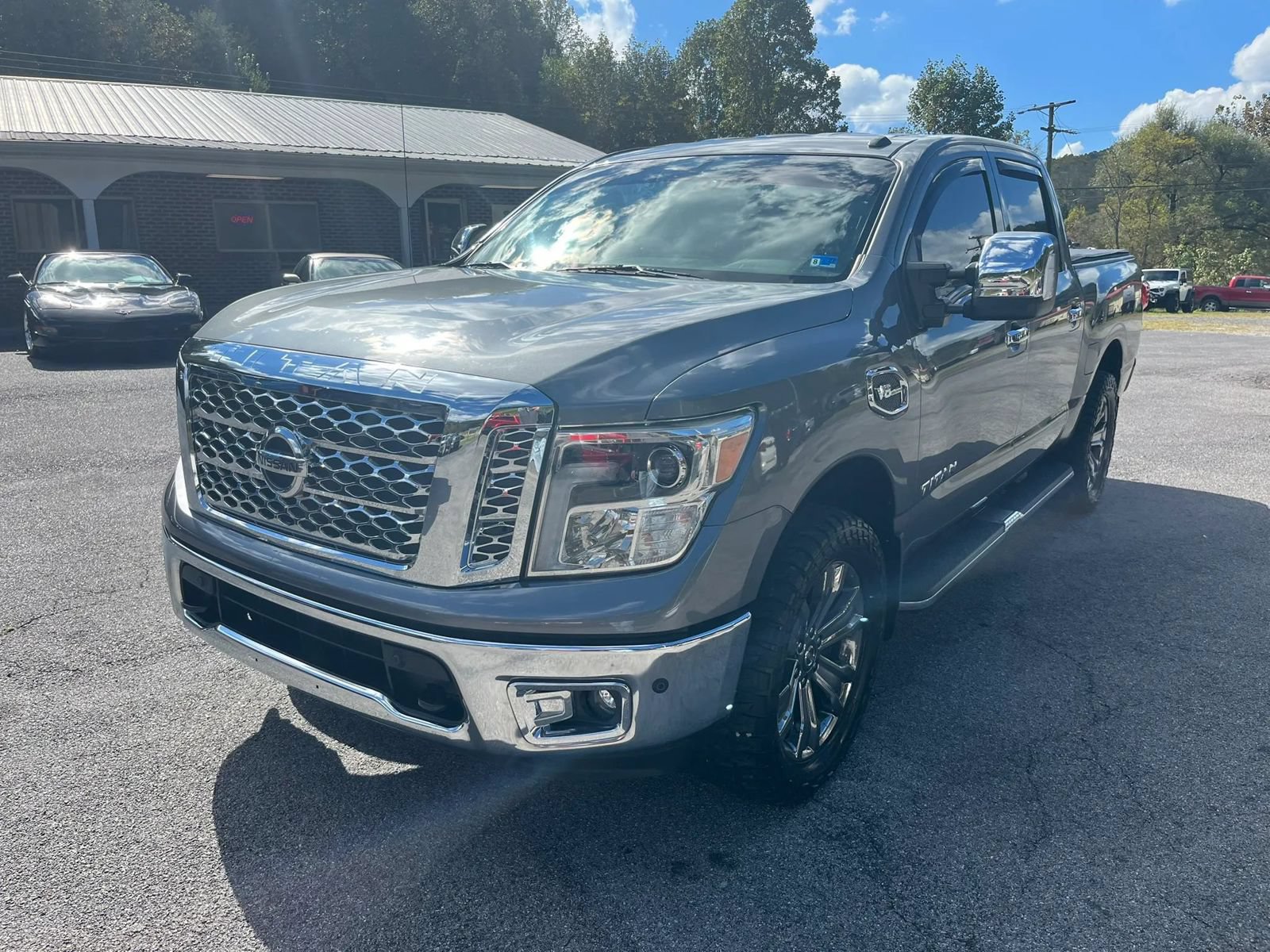 Used 2017 Nissan Titan SL w/ Chrome Package AWD/4WD image 1