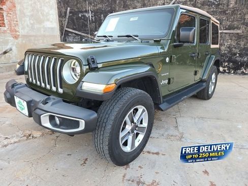 Used 2021 Jeep Wrangler Unlimited Sahara w/ LED Lighting Group AWD/4WD image 1