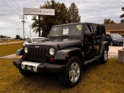 Used 2011 Jeep Wrangler Unlimited Sahara w/ Dual Top Group