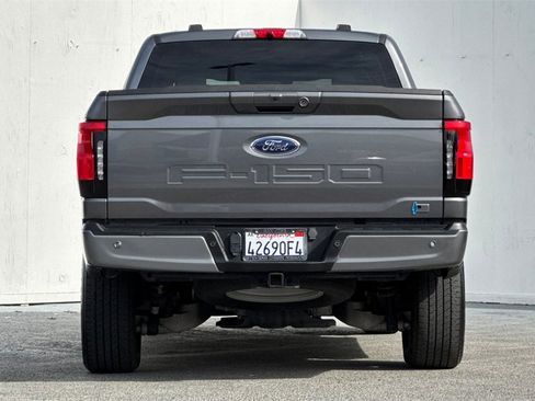 Used 2023 Ford F150 Lightning XLT w/ Equipment Group 312A High image 4