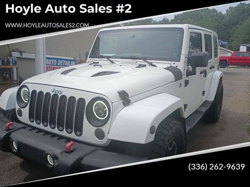 Used 2014 Jeep Wrangler Unlimited Sahara w/ Max Tow Package AWD/4WD image 1