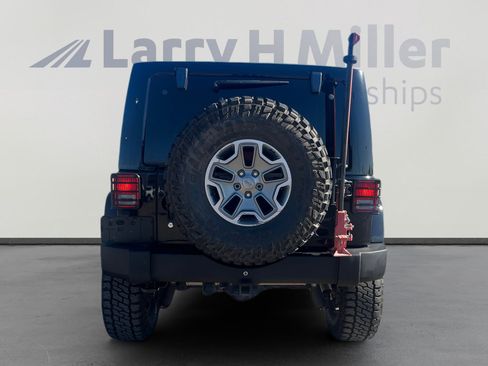Used 2013 Jeep Wrangler Unlimited Rubicon w/ Dual Top Group AWD/4WD image 4