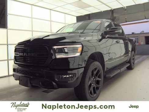 Used 2023 RAM 1500 Laramie AWD/4WD image 1
