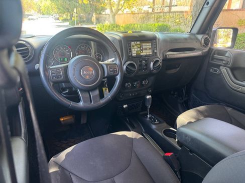 Used 2015 Jeep Wrangler Unlimited Sport w/ Dual Top Group AWD/4WD image 14