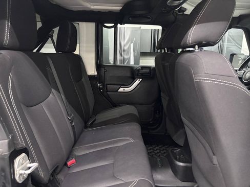 Used 2013 Jeep Wrangler Unlimited Sahara w/ Dual Top Group AWD/4WD image 22