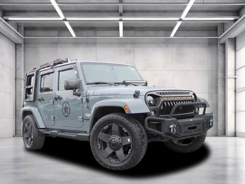 Used 2014 Jeep Wrangler Unlimited Sahara w/ Dual Top Group image 1