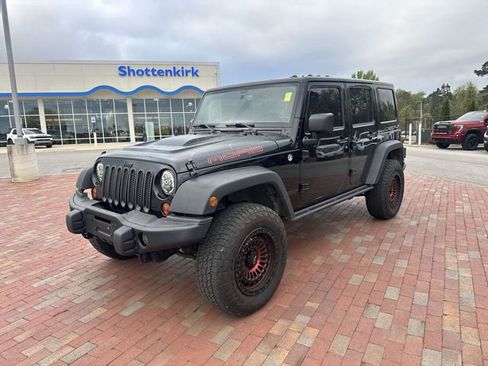 Used 2013 Jeep Wrangler Unlimited Sahara w/ Dual Top Group image 1