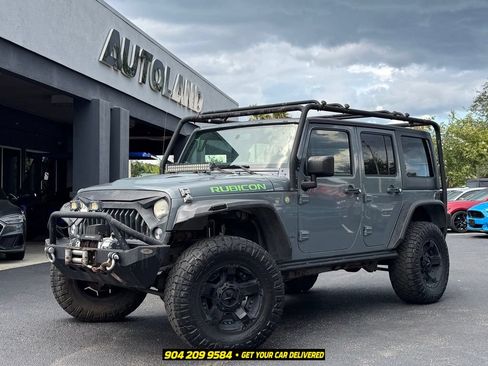 Used 2014 Jeep Wrangler Unlimited Rubicon AWD/4WD image 1