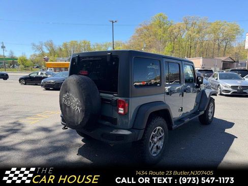 Used 2015 Jeep Wrangler Unlimited Rubicon w/ Dual Top Group AWD/4WD image 8