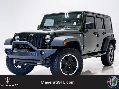 Used 2011 Jeep Wrangler Unlimited Sport AWD/4WD image 1