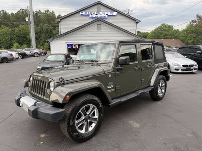 Used 2015 Jeep Wrangler Unlimited Sahara w/ Dual Top Group