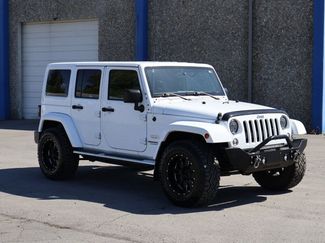 Used 2015 Jeep Wrangler Unlimited Sahara w/ Dual Top Group AWD/4WD video 3