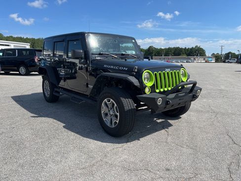 Used 2013 Jeep Wrangler Unlimited Rubicon w/ Dual Top Group AWD/4WD image 7
