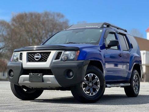 Used 2013 Nissan Xterra X AWD/4WD image 1