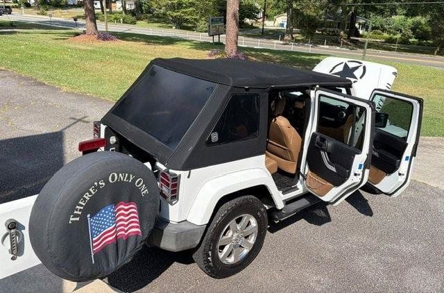 Used 2013 Jeep Wrangler Unlimited Sahara w/ Dual Top Group AWD/4WD image 28