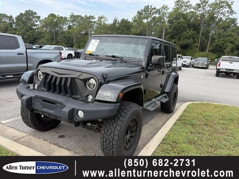 Used 2016 Jeep Wrangler Unlimited Sahara AWD/4WD image 1
