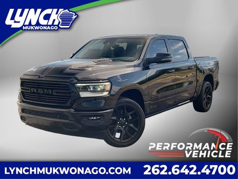 Used 2024 RAM 1500 Laramie AWD/4WD image 1