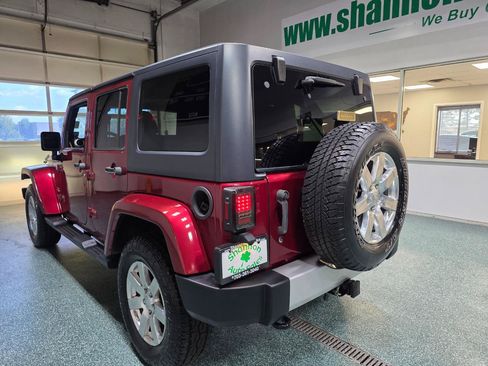 Used 2012 Jeep Wrangler Unlimited Sahara w/ Max Tow Pkg AWD/4WD image 9