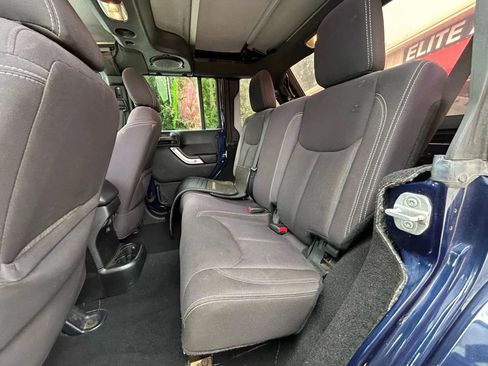 Used 2013 Jeep Wrangler Unlimited Sahara w/ Dual Top Group image 30