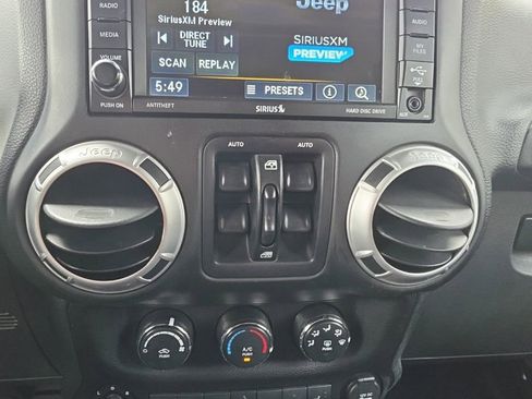 Used 2015 Jeep Wrangler Unlimited Sahara w/ Dual Top Group AWD/4WD image 13