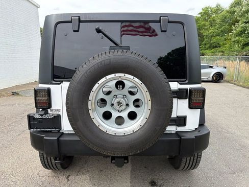 Used 2011 Jeep Wrangler Unlimited Rubicon w/ Dual Top Group AWD/4WD image 3