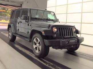 Used 2016 Jeep Wrangler Unlimited Sahara AWD/4WD video 2