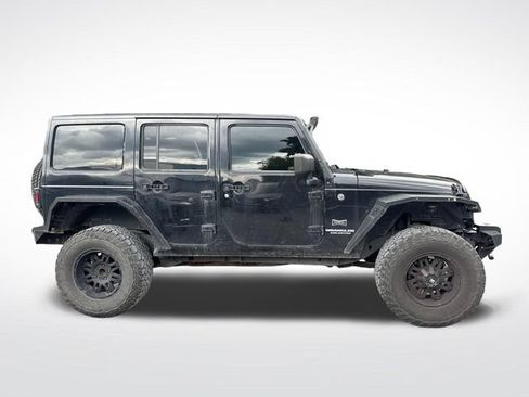 Used 2012 Jeep Wrangler Unlimited Sahara w/ Dual Top Group AWD/4WD image 7