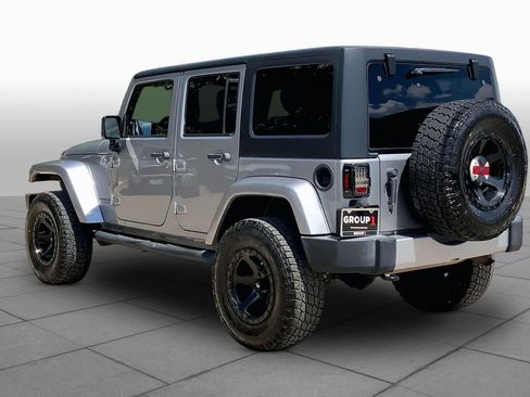 Used 2015 Jeep Wrangler Unlimited Sahara w/ Dual Top Group AWD/4WD image 11