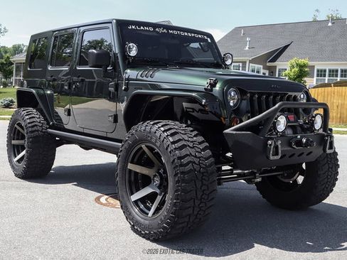 Used 2010 Jeep Wrangler Unlimited Rubicon w/ Dual Top Group AWD/4WD image 12