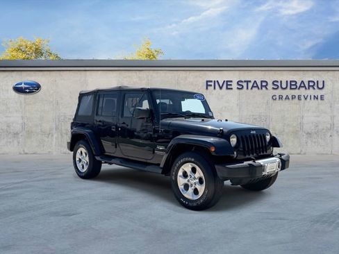 Used 2014 Jeep Wrangler Unlimited Sahara w/ Connectivity Group AWD/4WD image 1
