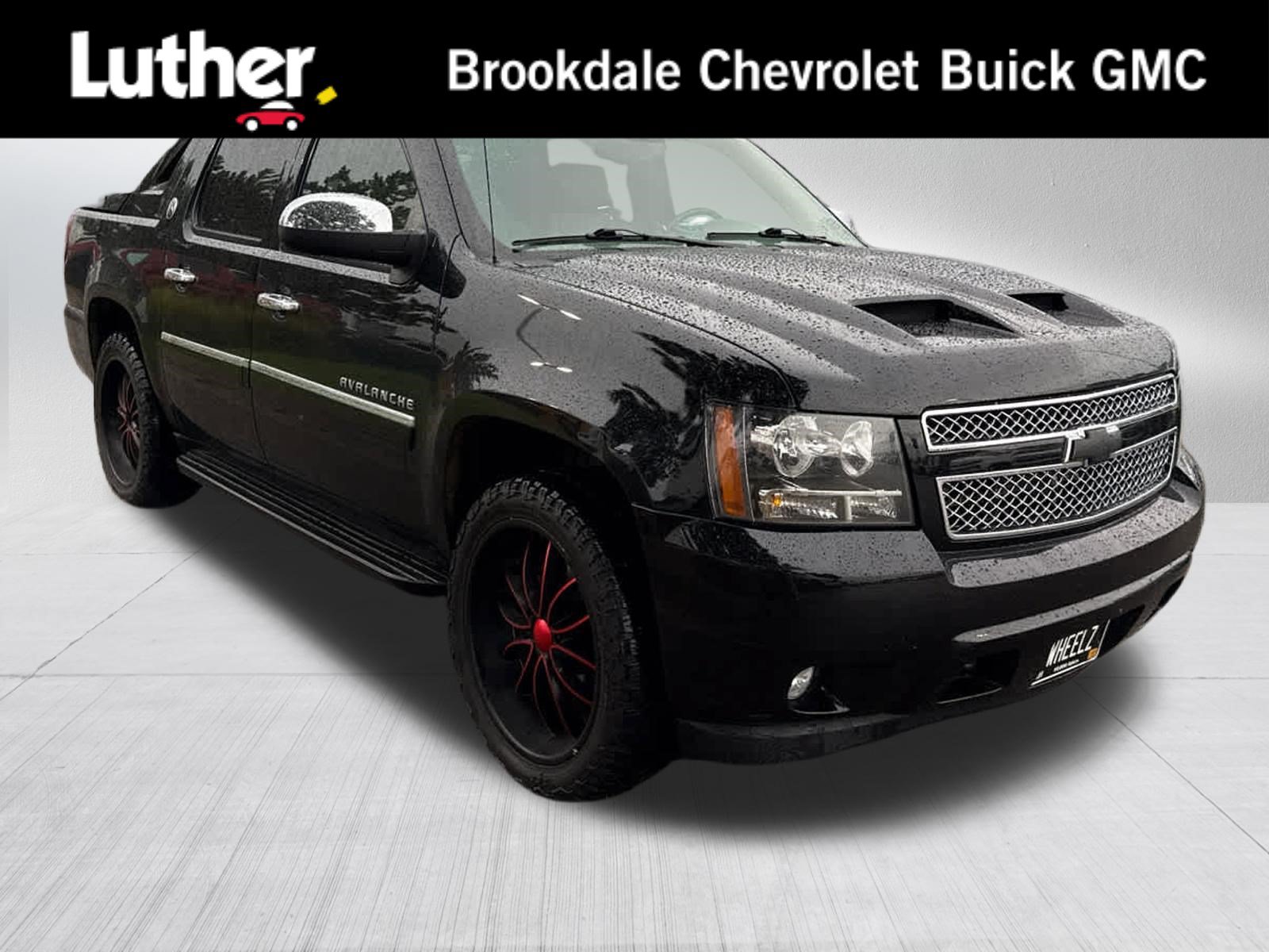Used 2013 Chevrolet Avalanche LTZ AWD/4WD image 1
