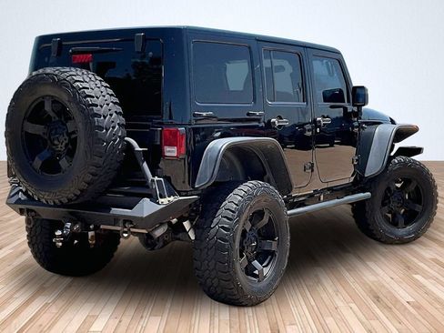 Used 2012 Jeep Wrangler Unlimited Sahara AWD/4WD image 2