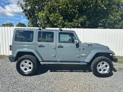 Used 2014 Jeep Wrangler Unlimited Sahara w/ Mopar Chrome Edition Group AWD/4WD image 6