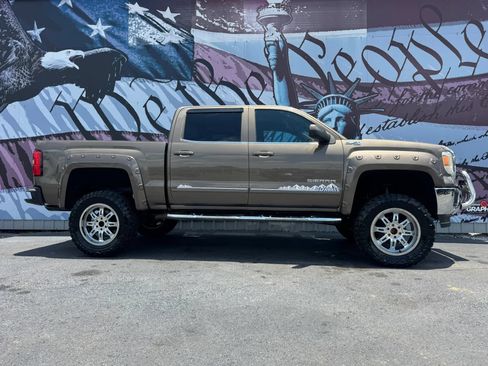 Used 2014 GMC Sierra 1500 SLE w/ SLE Value Package AWD/4WD image 1