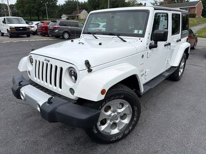 Used 2015 Jeep Wrangler Unlimited Sahara w/ Dual Top Group