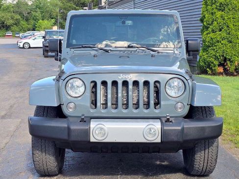 Used 2014 Jeep Wrangler Unlimited Sahara w/ Dual Top Group AWD/4WD image 9