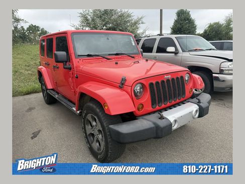 Used 2013 Jeep Wrangler Unlimited Sahara w/ Mopar Chrome Edition Group AWD/4WD image 1