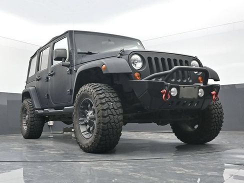 Used 2012 Jeep Wrangler Unlimited Sahara AWD/4WD image 1