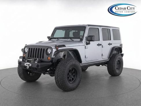 Used 2012 Jeep Wrangler Unlimited Rubicon w/ Connectivity Group AWD/4WD image 1