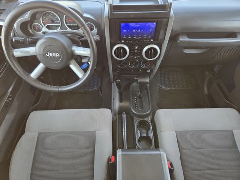 Used 2010 Jeep Wrangler Unlimited Sahara w/ Dual Top Group AWD/4WD image 21