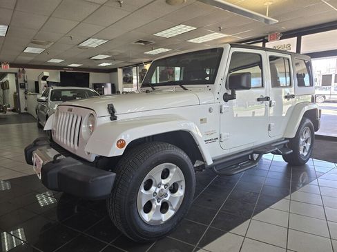 Used 2014 Jeep Wrangler Unlimited Sahara w/ Connectivity Group image 1