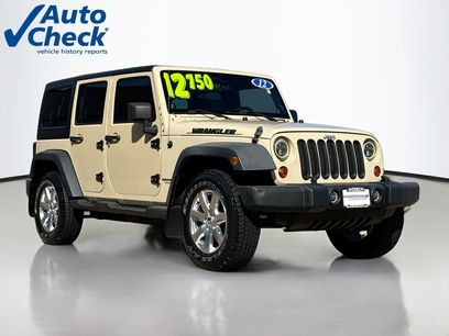 Used 2012 Jeep Wrangler Unlimited Sport w/ Dual Top Group