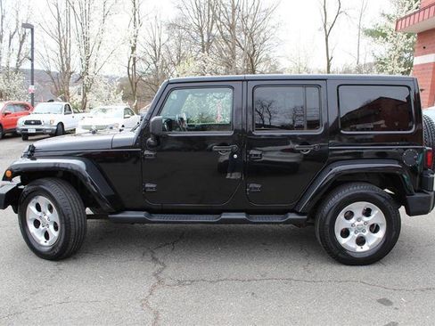 Used 2014 Jeep Wrangler Unlimited Sahara w/ Dual Top Group image 2