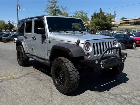 Used 2011 Jeep Wrangler Unlimited Sport AWD/4WD image 2