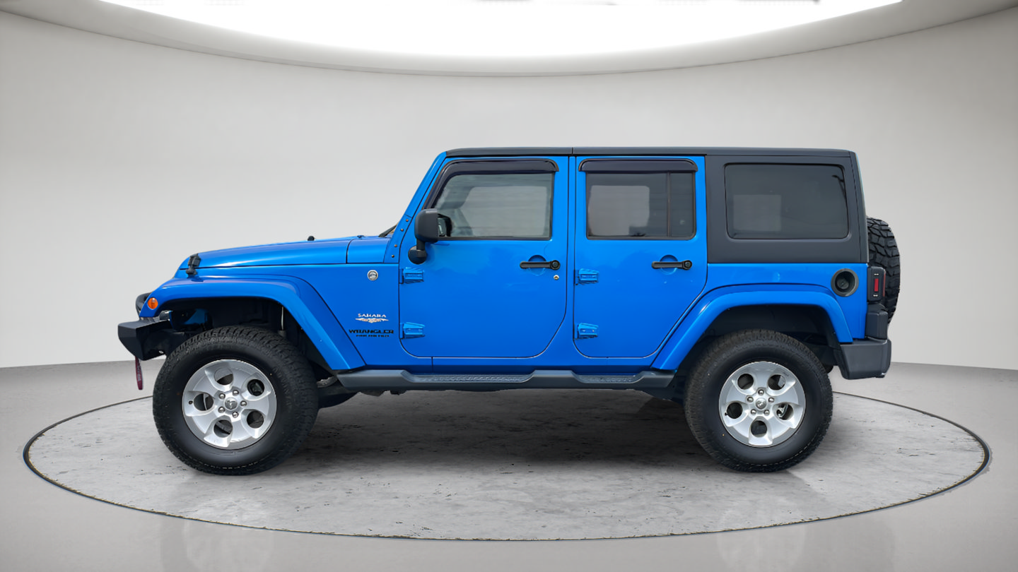 Used 2014 Jeep Wrangler Unlimited Sahara w/ Dual Top Group AWD/4WD image 8