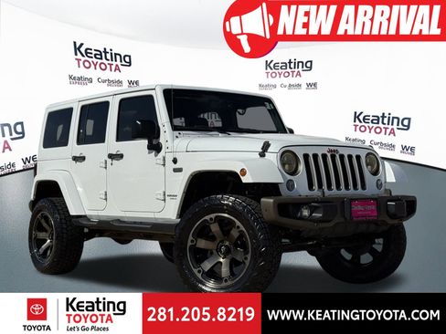 Used 2016 Jeep Wrangler Unlimited Sahara image 1